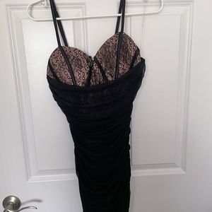 Black and tan dress with corset top and black over lay.